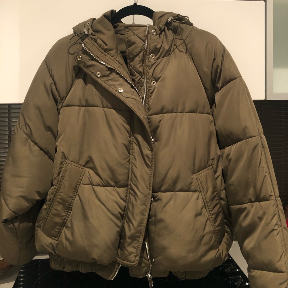Green puffer coat